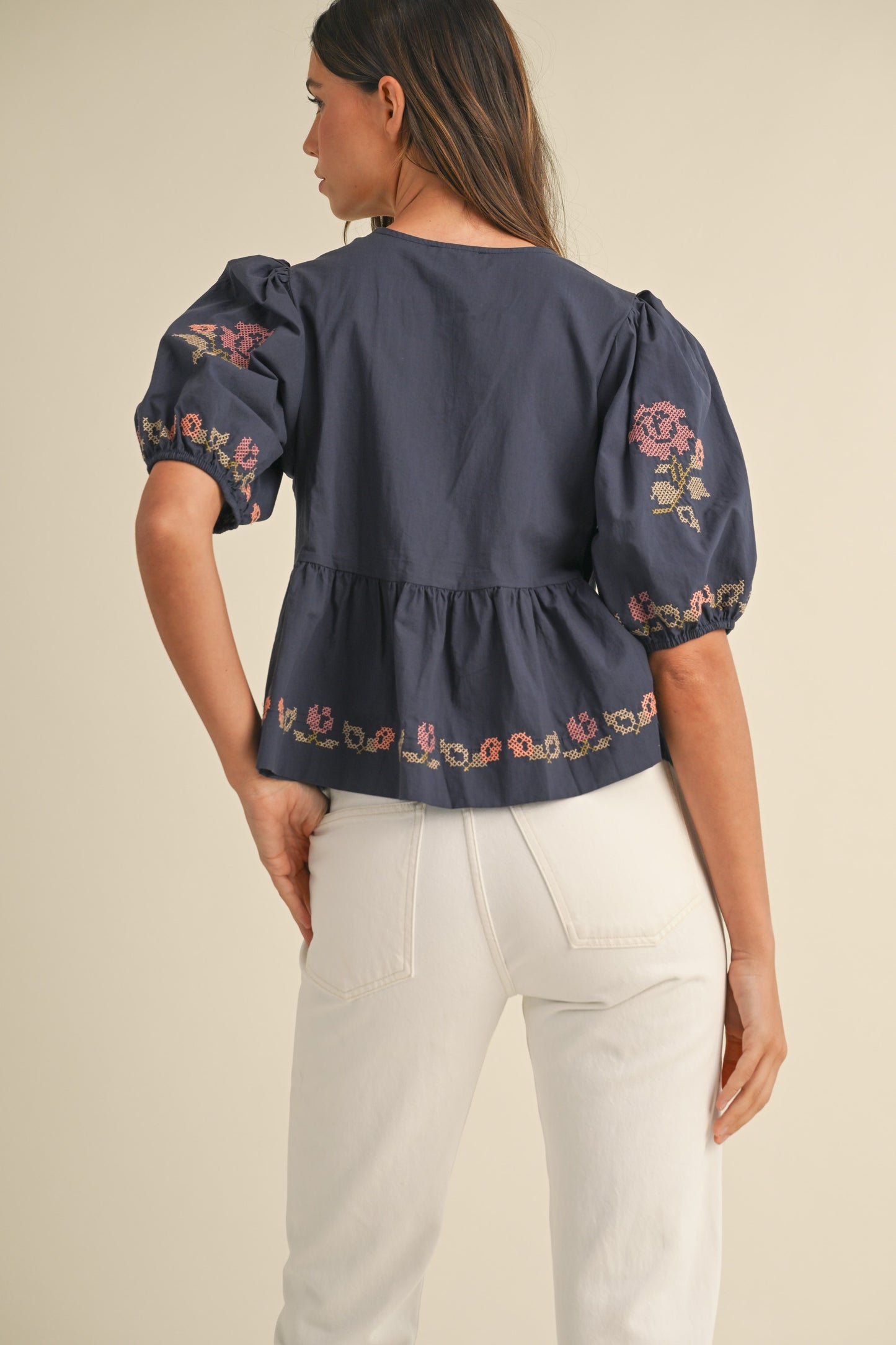The Roslyn Embroidered puff Sleeve Front Tie Peplum Top Navy