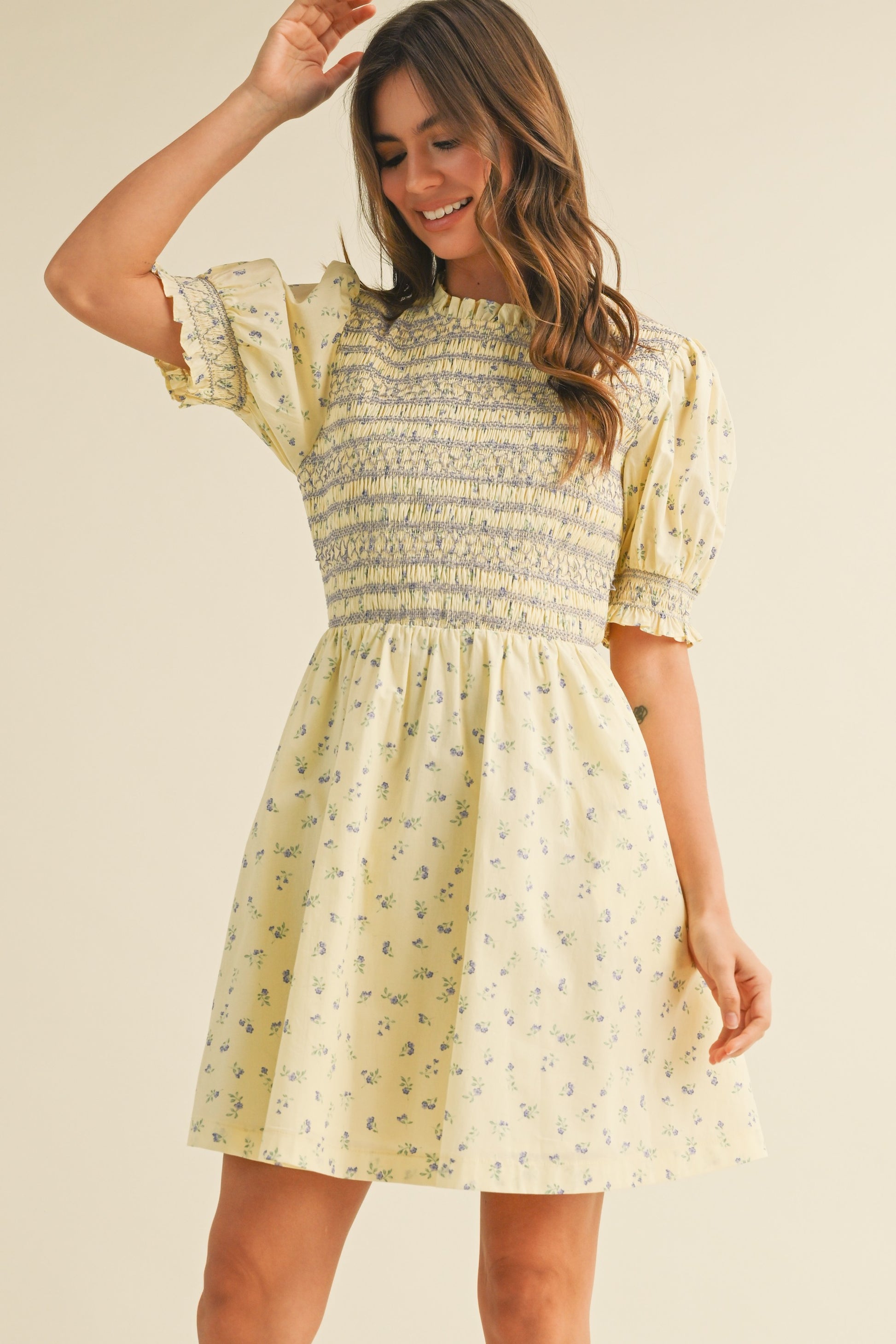The Daisy Smocked Short Sleeve Floral Mini The Daisy Smocked Short Sleeve Floral Mini