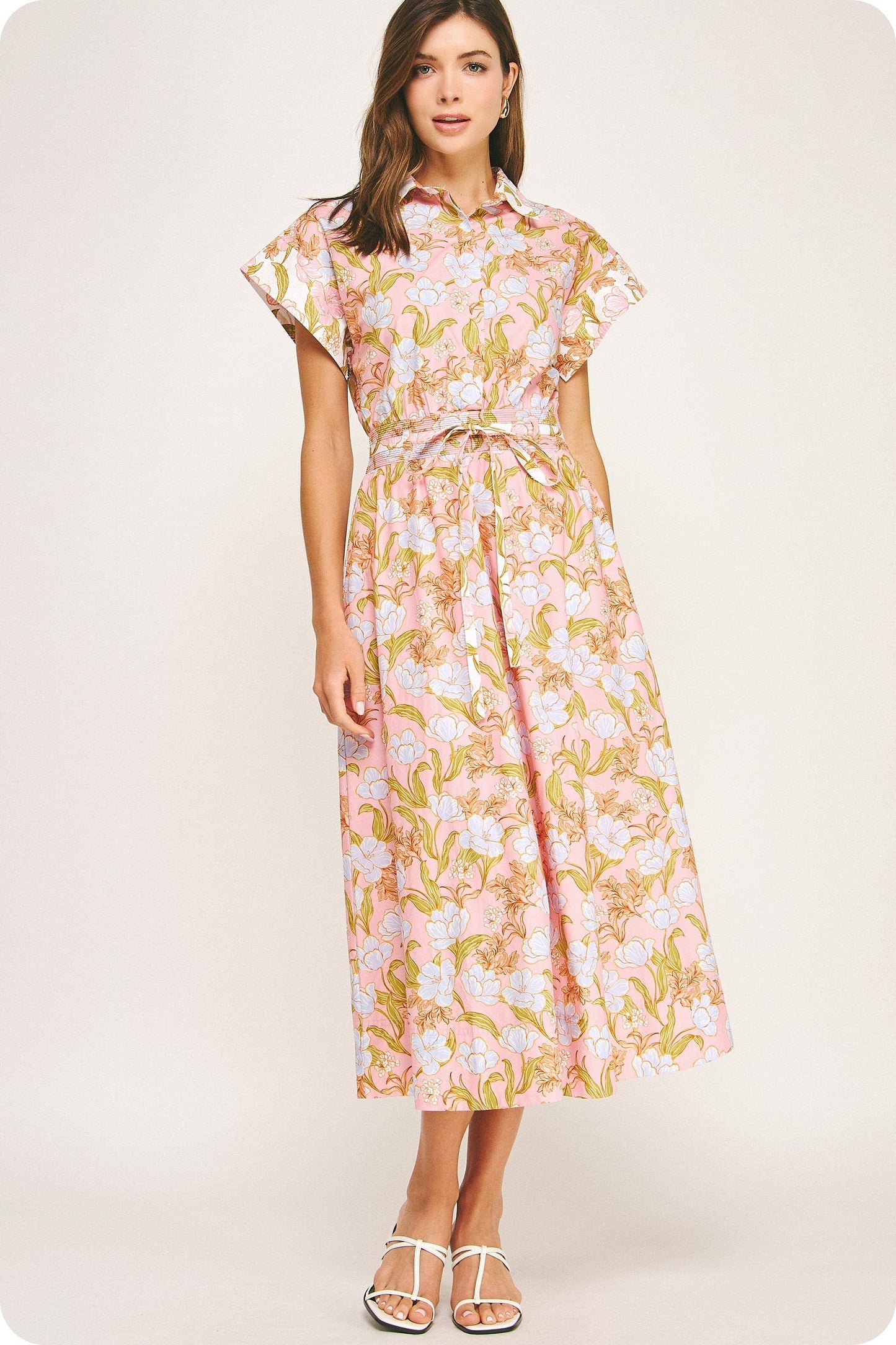 button down midi shirt dress with belt and blue and pink floral design 